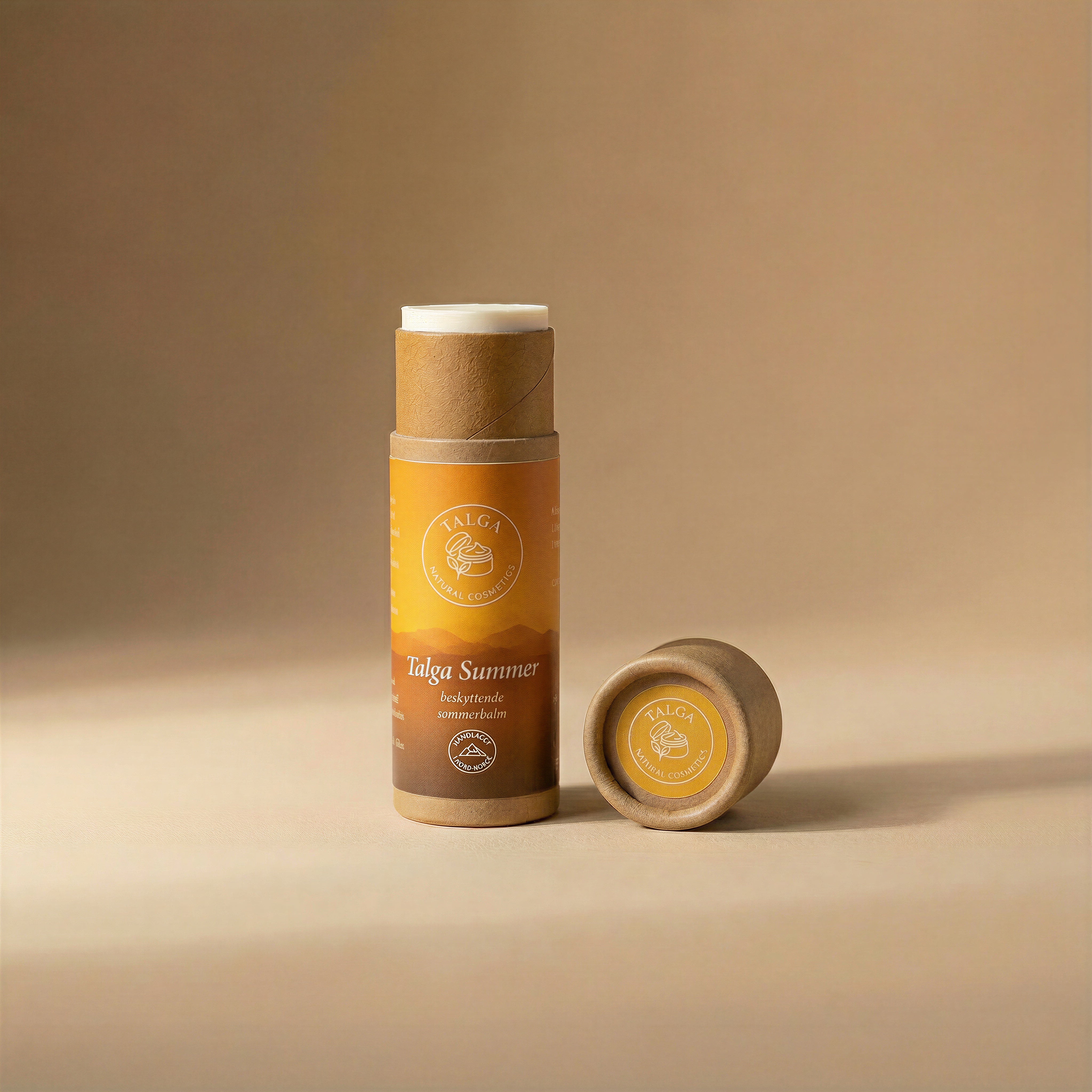 Talga Summer protective balm stick with the cap off and balm exposed, on a beige background.