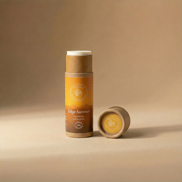 Talga Summer protective balm stick with the cap off and balm exposed, on a beige background.